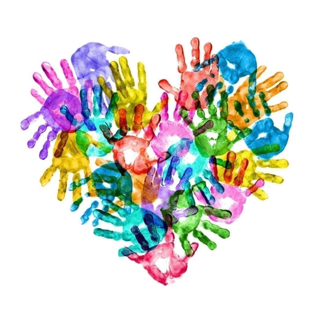 Colorful overlapping handprints arranged in a heart shape on a white background